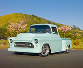 AUT 14 RK1616 01
1957 Chevrolet Pickup Truck Pastel Aqua 3/4 Front View On Pavement By Cherry Blossom Trees