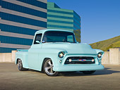 AUT 14 RK1618 01
1957 Chevrolet Pickup Truck Pastel Aqua 3/4 Front View On Pavement By Building