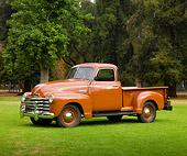 AUT 14 RK1627 01
1949 Chevrolet 3100 Pickup Truck Brown 3/4 Side View On Grass By Trees