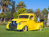 AUT 14 RK1628 01
1941 Chevrolet Pickup Truck Yellow 3/4 Front View On Grass By Palm Trees