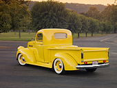 AUT 14 RK1633 01
1941 Chevrolet Pickup Truck Yellow 3/4 Rear View On Pavement By Grass And Trees
