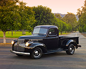AUT 14 RK1639 01
1946 Chevrolet Pickup Truck Black 3/4 Front View On Pavement By Grass And Trees