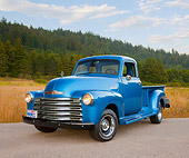 AUT 14 RK1644 01
1948 Chevrolet Thriftmaster Pickup Truck Blue 3/4 Front View On Pavement By Meadow And Trees
