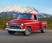 AUT 14 RK1654 01
1957 Chevrolet 1/2 Ton Pickup Truck Red 3/4 Front View On Pavement By Trees And Mountains