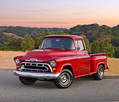 AUT 14 RK1657 01
1957 Chevrolet 1/2 Ton Pickup Truck Red 3/4 Front View On Pavement By Field And Trees
