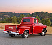 AUT 14 RK1659 01
1957 Chevrolet 1/2 Ton Pickup Truck Red 3/4 Rear View On Pavement By Field And Trees
