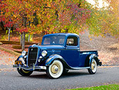 AUT 14 RK1681 01
1935 Ford 1/2 Ton Pickup Truck Blue Over Black 3/4 Front View On Pavement By Autumn Trees