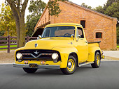 AUT 14 RK1683 01
1955 Ford F-100 Pickup Truck Yellow 3/4 Front View On Pavement By Brick Building