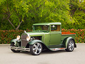 AUT 14 RK1693 01
1930 Ford Model A Green 3/4 Front View On Pavement By Trees