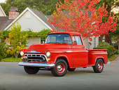 AUT 14 RK1710 01
1957 Chevrolet 3100 Pickup Red 3/4 Front View On Pavement By House