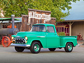 AUT 14 RK1711 01
1957 Chevrolet 3100 Pickup Green 3/4 Front View On Pavement By Old Building