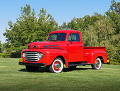 AUT 14 RK1720 01
1949 Ford F-1 Pickup Red 3/4 Front View On Grass By Trees