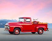 AUT 14 RK1727 01
1956 Ford F-100 Red With Whizzer Motorbike 3/4 Side View On Pavement By Icy Mountains