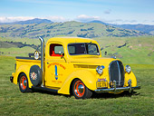 AUT 14 RK1746 01
1938 Ford Pickup Corvette Yellow With Pipes 3/4 Front View On Grass By Hills