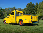 AUT 14 RK1748 01
1938 Ford Pickup Corvette Yellow With Pipes 3/4 Rear View On Grass By Trees