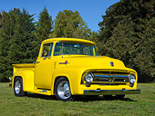 AUT 14 RK1749 01
1956 Ford F-100 Vivid Canary Yellow 3/4 Front View On Grass By Trees
