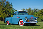 AUT 14 RK1760 01
1957 Chevrolet 3200 Pickup Dove Blue 3/4 Front View On Grass By Trees