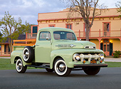 AUT 14 RK1776 01
1952 Ford F-1 Pickup Glen Mist Green 3/4 Front View On Pavement By Building