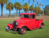 AUT 14 RK1791 01
1934 Ford Pickup Red 3/4 Front View On Grass By Palm Tree