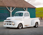 AUT 14 RK1798 01
1951 Ford F-1 White Pearl 3/4 Side View On Pavement By Blue Barn