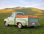 AUT 14 RK1806 01
1949 Studebaker 2R5 Pickup Green 3/4 Rear View On Grass By Hills