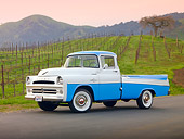 AUT 14 BK0004 01
1957 Dodge Sweptside Pickup Truck Blue And White 3/4 Front View On Road By Vineyard