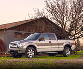 AUT 14 BK0011 01
2009 Ford F-150 Supercab XLT Pickup Truck Gray 3/4 Front View On Dirt By Barn