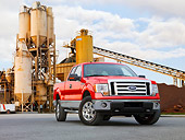 AUT 14 BK0014 01
2009 Ford F-150 Supercab XLT Pickup Truck Red 3/4 Front View On Pavement By Plant