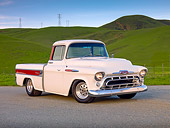 AUT 14 BK0021 01
1957 Chevrolet Cameo Pickup Truck White 3/4 Front View On Pavement By Hills