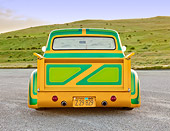 AUT 14 BK0027 01
1956 Ford F-100 Pickup Truck Custom Green And Gold Rear View On Pavement By Hills