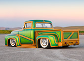 AUT 14 BK0028 01
1956 Ford F-100 Pickup Truck Custom Green And Gold 3/4 Rear View On Pavement By Hills