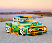 AUT 14 BK0029 01
1956 Ford F-100 Pickup Truck Custom Green And Gold 3/4 Front View On Pavement By Hills And Lake