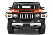AUT 14 IZ0040 01
2010 Hummer H2 SUT Orange Head On View Studio