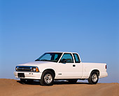 AUT 14 RK0009 03
1997 Chevrolet S-10 Extended Cab White 3/4 Side View On Pavement Hill Blue Sky
