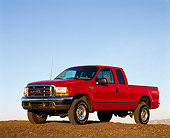 AUT 14 RK0043 04
1999 Ford F250 XLT Super Duty 4x4 Triton V10 Red 3/4 Front View On Dirt Blue Sky