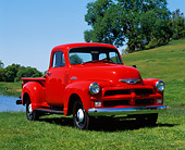 AUT 14 RK0080 02
1954 Chevrolet 1/2 Ton Pick Up Truck Red 3/4 Front View On Grass By Lake