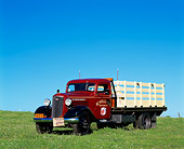 AUT 14 RK0082 02
1936 GMC Truck Burgundy 3/4 Front View On Grass Blue Sky