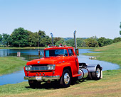 AUT 14 RK0084 07
1959 Ford F-9000 Semi Truck Orange 3/4 Front View On Grass By Lake