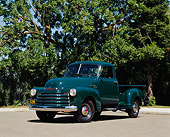 AUT 14 RK0107 01
1951 Chevy 3100 1/2 Ton Pick Up Truck Green Low 3/4 Front View On Pavement By Trees