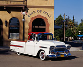 AUT 14 RK0109 02
1959 Chevy Apache Fleetside Pick Up Truck White 3/4 Front View On Pavement By Building