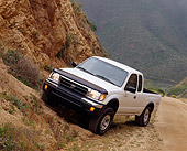 AUT 14 RK0163 01
1999 Toyota Tacoma X-Tra 4x4 Truck White 3/4 Front View On Dirt Hill