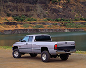 AUT 14 RK0182 02
1999 Dodge Ram 2500 Truck Gray 3/4 Rear View On Dirt By Water