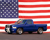 AUT 14 RK0229 01
Dodge Viper Ram VTS Concept Truck Blue 3/4 Side View American Flag Background