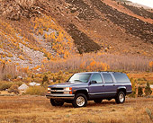 AUT 14 RK0288 05
1997 Chevrolet Suburban Blue 3/4 Side View By Hill