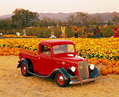 AUT 14 RK0319 10
1935 Ford 1/2 Ton Pickup Truck Red 3/4 Front View At Pumpkin Patch Filtered