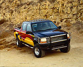 AUT 14 RK0336 18
2000 Ford F350 4x4 Crew Cab Steel Horse Custom Pickup Truck 3/4 Front View On Dirt