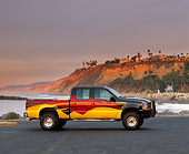 AUT 14 RK0340 05
2000 Ford F350 4x4 Crew Cab Steel Horse Custom Pickup Truck Profile On Pavement On Coast