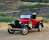 AUT 14 RK0419 02
1930 Ford Model A Roadster Pickup Truck 3/4 Front View On Dirt By Tall Grass