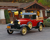 AUT 14 RK0421 04
1930 Ford Model A Roadster Pickup Truck Red 3/4 Front View On Pavement