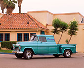 AUT 14 RK0434 04
1956 Chevrolet Pickup Truck Green Blue 3/4 Side View By Building